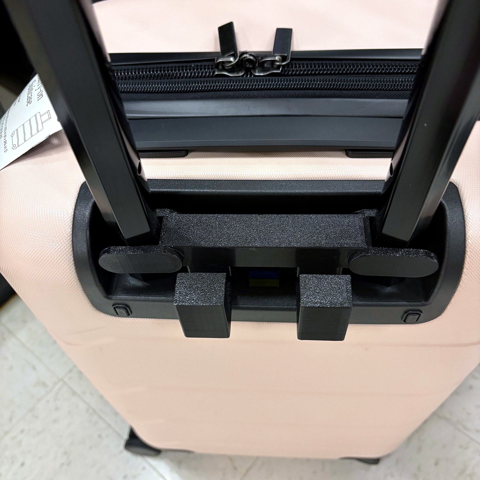 RAILTOTE on pink hardside case