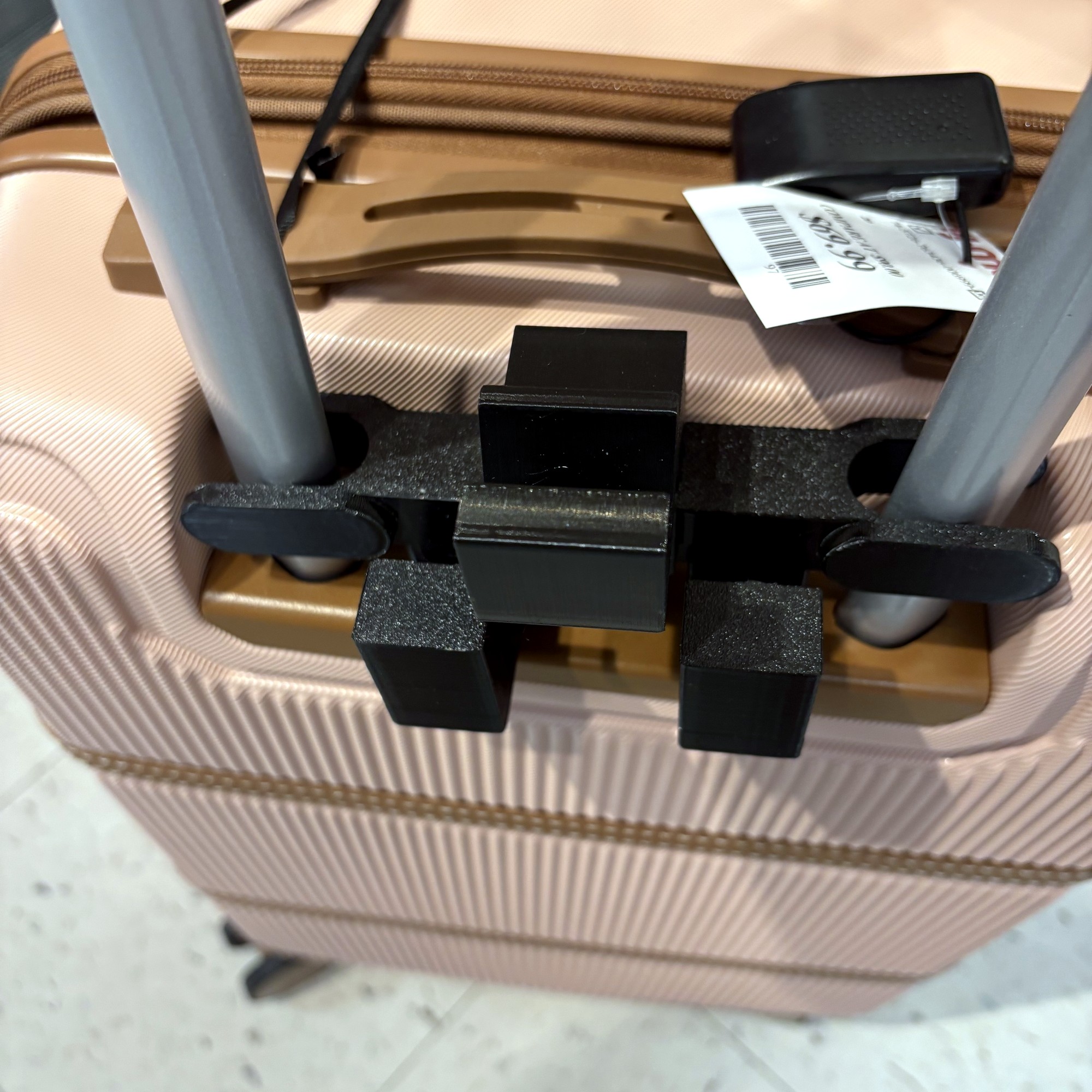 RAILTOTE on rose gold hardside case